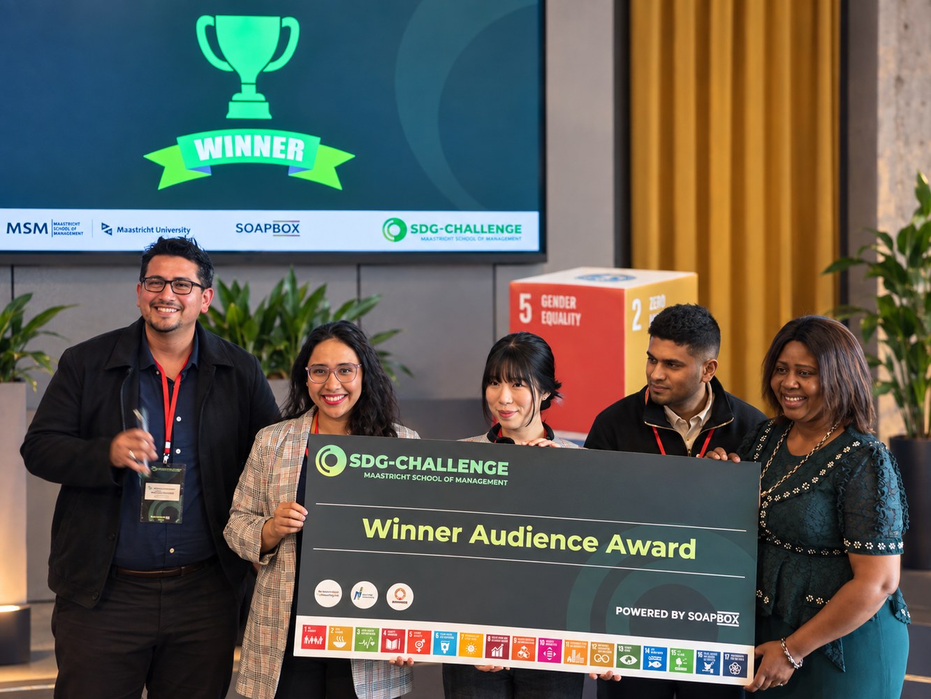 Karla Guerra with the SDG Challenge Audience Award team